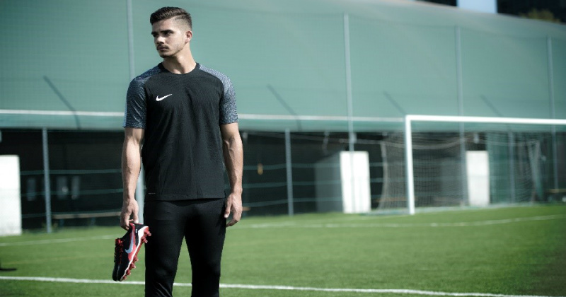 Nike Venoms being held