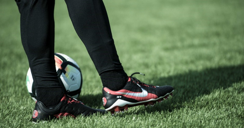 Holding the Nike Hypervenoms