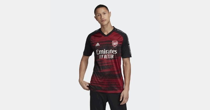 arsenal red and black 2020/21 pre-match shirt on white background