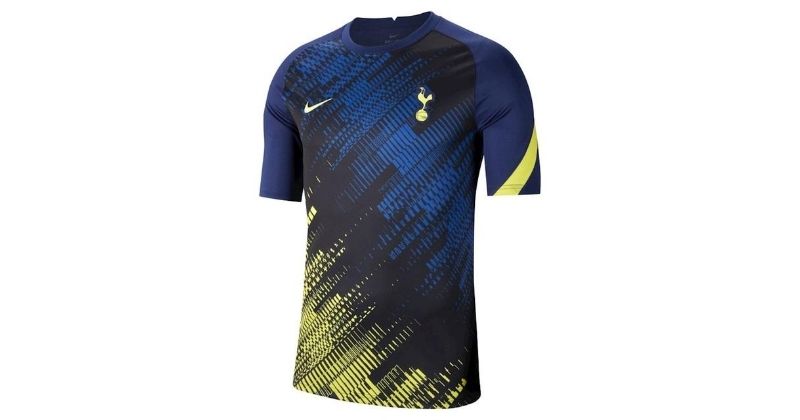 tottenham hotspur blue and yellow 2020/21 pre-match shirt on white background