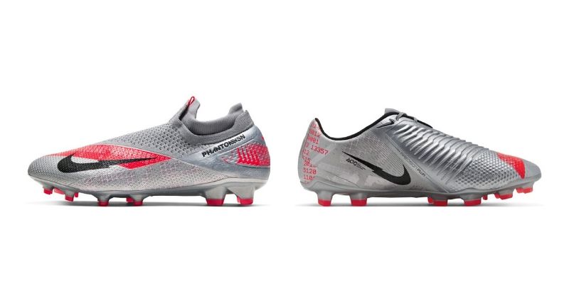 Nike Phantom Venom and Vision football boots in silver and pink facing each other
