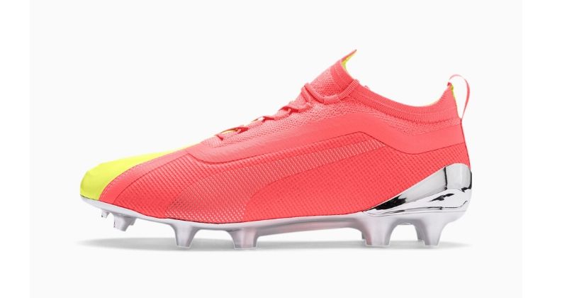 Puma One in pink and yellow on white background