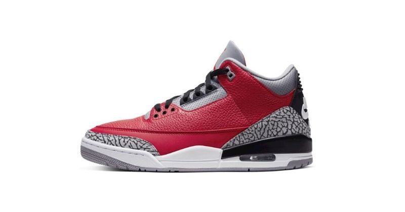 Nike Air Jordan III 3 in red with animal print detail on white background