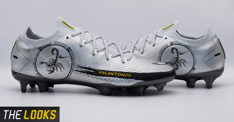 nike phantom gt scorpion football boots in silver on grey background