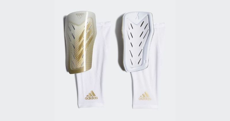 adidas x20 shin pads in white and gold