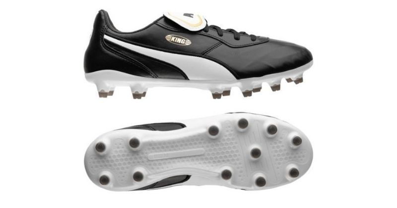 puma king football boots in black and white