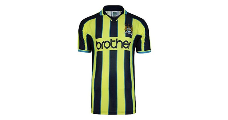 man city 1999 away shirt in yellow and navy