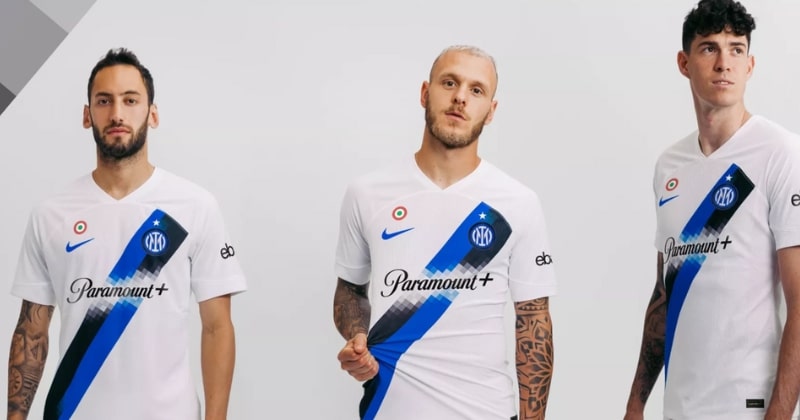 three players wearing inter milan 2023-24 away shirt in white