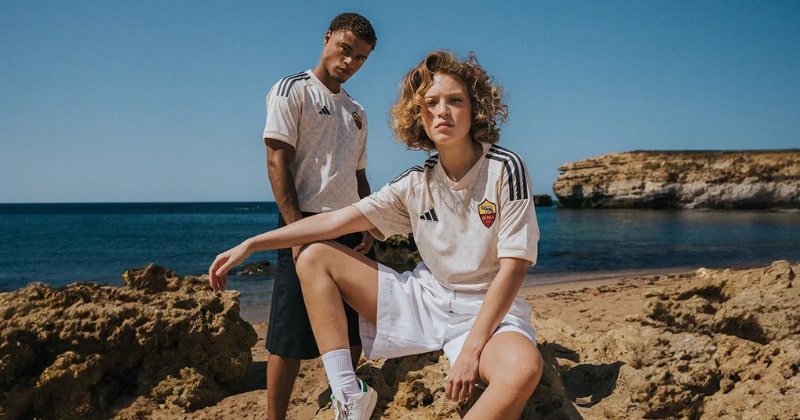male and female models wearing roma 2023-24 away shirt in white