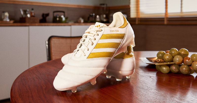 adidas copa football boots in white clean on a kitchen table