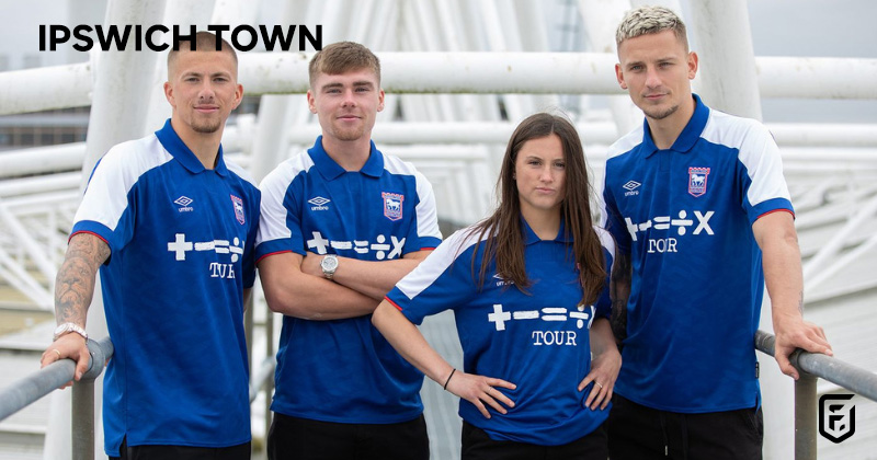 male and female players wearing ipswich town 2023-24 home shirts in blue and white