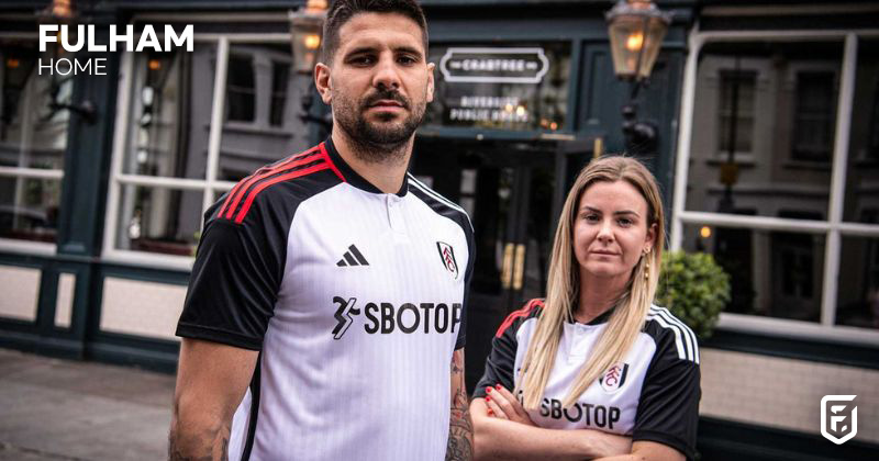 fulham 2023-24 home shirt in black and white with red stripes