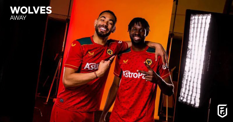 wolverhampton wanderers 2023-24 away shirt in red and black with yellow trim