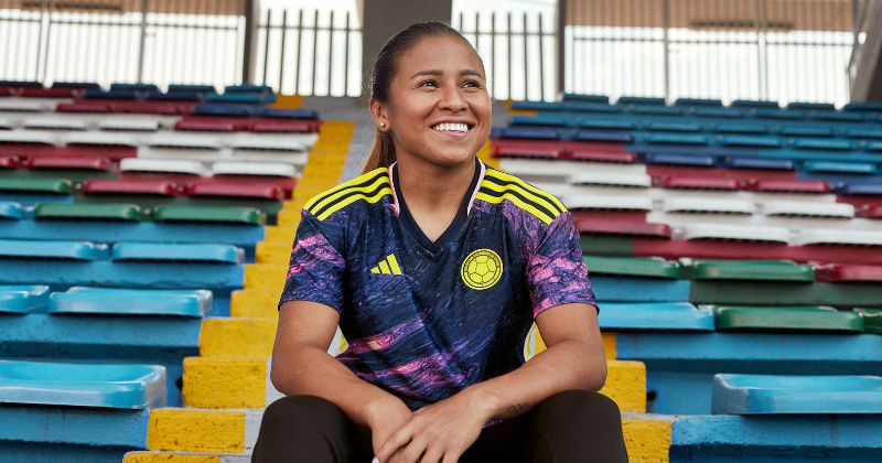 womens colombia away shirt 2023 in purple and yellow