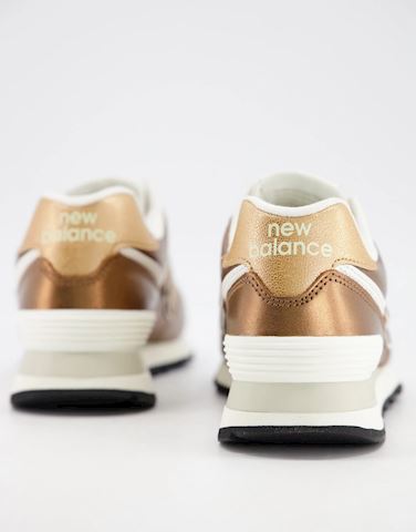 New Balance 574 trainers in bronze 