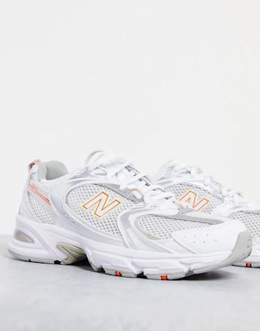 white and silver new balance 530