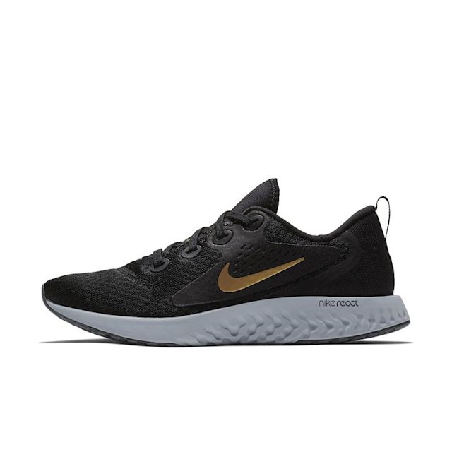 nike running legend react trainers in black and gold