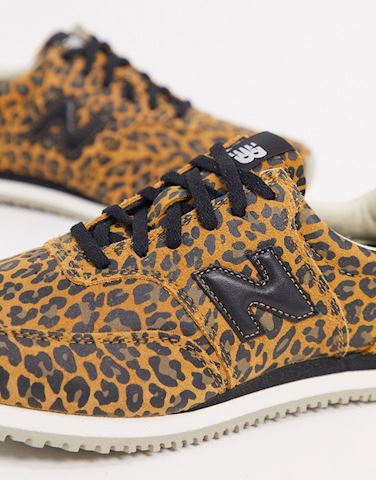 black trainers with animal print