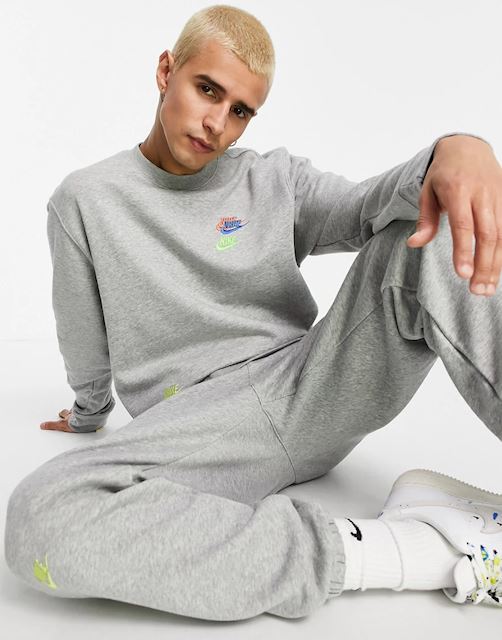 nike essential fleece multi logo joggers