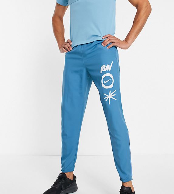 Nike Running Tall Wild Run challenger woven joggers in blue DD4904