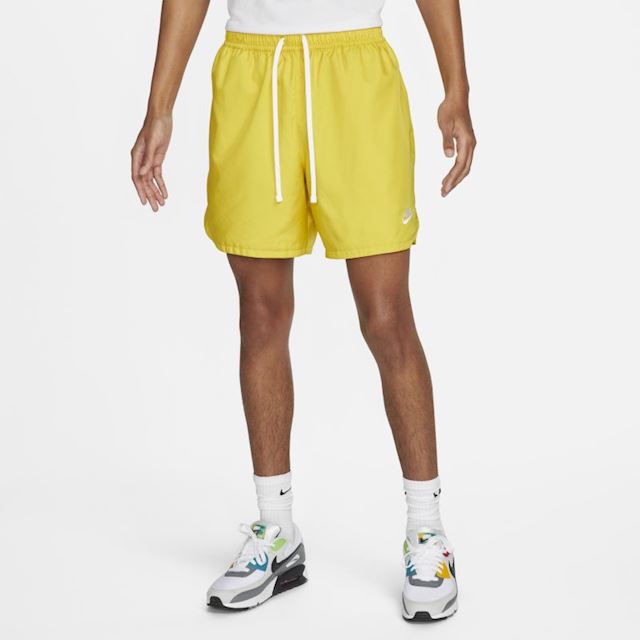 yellow nike woven shorts