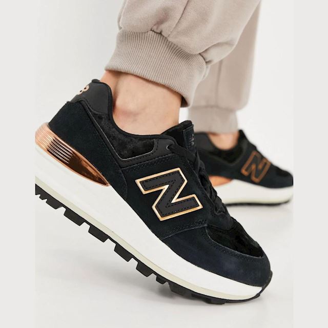 New Balance 574 wedge trainers in black 